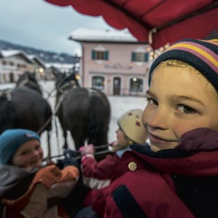 Kinder- und Familienprogramm winterliche Kutschfahrt in der Alpenwelt Karwendel, © Alpenwelt Karwendel | Martin Kriner