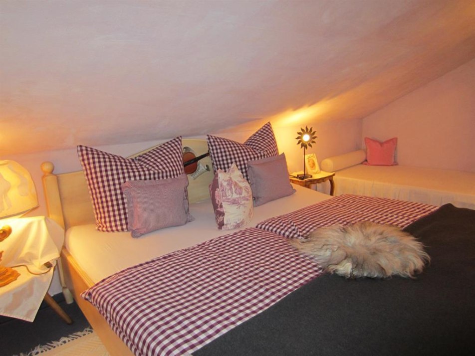 Bedroom at the head end with sloping roof more suitable for smaller people