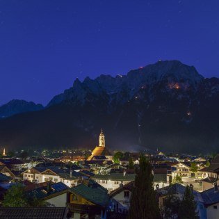 Mittenwald with mountain fire on the eve of St. John's Day