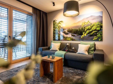 Wohnzimmer mit Schlafsofa