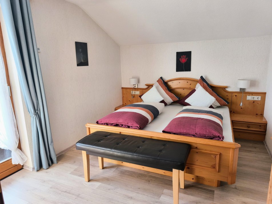 Schlafzimmer mit Balkon